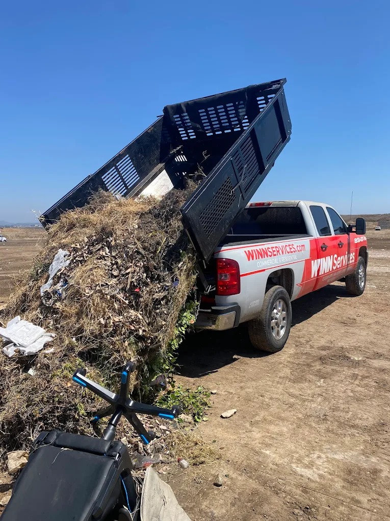 WINN Services junk removal truck loaded for a haul-away